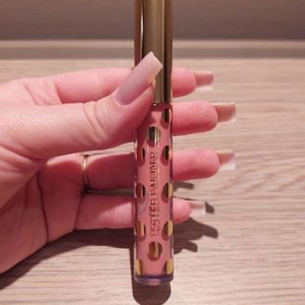 Brand new  Limited Edition Lip Gloss, full-size (.09 oz./2.7ml each)